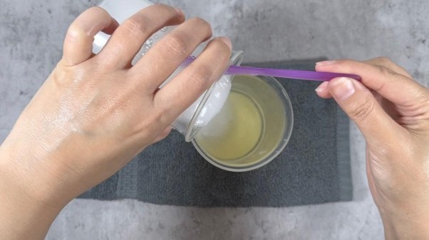 clear shampoo in beaker